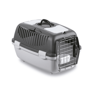 White background with a Krusse Stefanplast size 2 Travel Crate. The crate is light and dark grey plastic with a closed metal door.