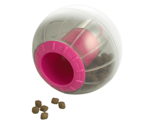 White background with a Kruuse Catmosphere treat dispenser, with a pink trim and transparent body with cat treats visible inside.