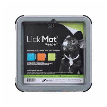 White background with a grey LickiMat Keeper for slow feeding mats. The Keeper has a black sticker inside with a French bulldog pictured and compatible feeding mats.