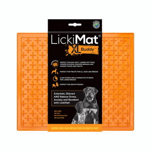 White background with a orange LickiMat XL Buddy slow feeder mat with a criss-cross surface. The Playdate mat is in black and orange packaging cardboard packaging.