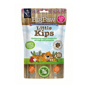 White background with a packet of Little BigPaw 'Little Kips' dog treats. Pictured on the packet is an illustration of a brown dog sleeping with a apples, berries, lemons and a jar of peanut butter in the foreground. Text on the bag says 'Chillaxing vegan treats for all dogs and puppies, 100% natural ingredients, soft & squidgy baked treats. Approx. 100 treats!'