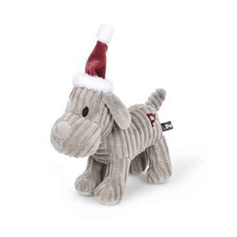 Side view of grey dog dog toy made from soft cord effect fleece material with red 'PF' stitched on hip, wearing a red Christmas hat, standing on a white background.