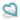 Tilted blue heart shaped rubber dog toy on a white background.