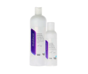 Two bottles of Malabeze shampoo on a white background