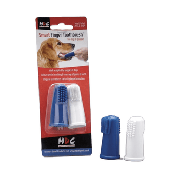 White background with a packet of MDC Smart Finger Toothbrushes with two finger toothbrushes pictured next to the packet, one blue and one white. Pictured on the packet is a Golden Retriever dog with a hand wearing the finger toothbrush, brushing the dog's teeth.