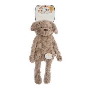 Light brown dog shaped dog toy with long arms and legs, white chin and stitched detail eyes, brown nose with tags attached to top and mid-section. Pictured on a white background.