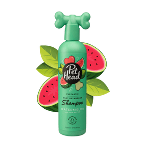 White background with a green bottle of Pet Head Furtastic shampoo for Dogs. On the bottle is illustrated watermelons, leaves and a dog bone with text 'Furtastic, Knot Detangler Shampoo, Watermelon with Shea Butter'.