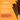 Promotional graphic for Pet Munchies Natural Pet Treats featuring several dog dental chews on a bright orange background with product text and paw-print motifs.