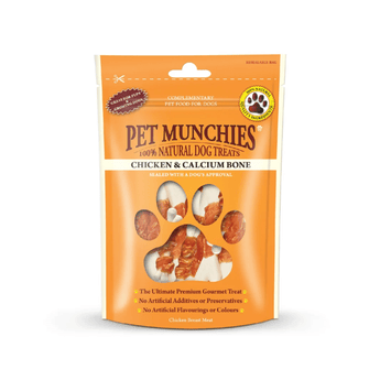 A stand-up pouch of Pet Munchies Chicken & Calcium Bone dog treats on a plain white background. The packaging is predominantly orange with a white band and a clear paw-shaped window showing the treats inside.