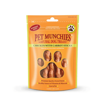 A stand-up pouch of Pet Munchies Chicken with Carrot sticks dog treats on a plain white background. The packaging is bright orange with a large paw-shaped window showing the chicken with carrot stick treats inside.