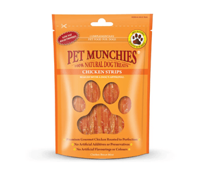 A stand-up pouch of Pet Munchies Chicken Strips dog treats on a plain white background. The packaging is bright orange with a large paw-shaped window showing the chicken strips inside.