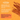 Pet Munchies natural pet treat with text explaining the features on an orange background.
