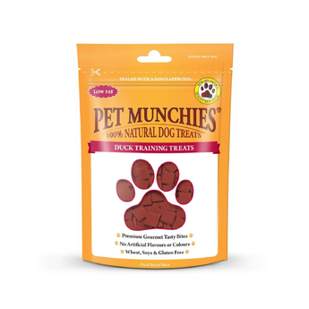 A stand-up pouch of Pet Munchies Duck training dog treats on a plain white background. The packaging is bright orange with a large paw-shaped window showing the duck training treats inside.