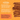 Promotional graphic for Pet Munchies Natural Pet Treats featuring several dog chews on a bright orange background with product text and paw-print motifs.