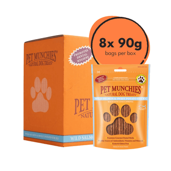 Pet Munchies Wild Salmon natural dog treats packaging, showing an orange box with a paw print, a single orange bag of treats in front, and a circular orange callout that reads '8x 90g bags per box' on a white background.