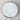 Round metal container with a label for pet information on a gray surface