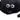Close up of face of black spider cat toy with stitched eye and smile details. On a white background.