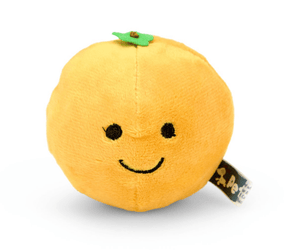 Orange fruit plush toy with green leaf detail and a smiley face.