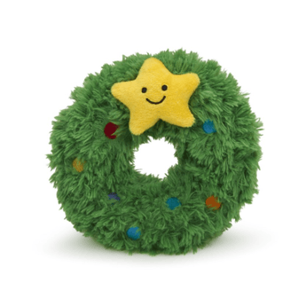 White background with a front view of a plush dog toy Christmas wreath with a plush star with stitched eyes and smile.