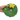 White background with a hand holding a plush dog toy Christmas wreath with a plush star with stitched eyes and smile.