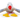 Close up of front of seagull dog toy with a white body, grey and blue wings and tail. Orange beak and yellow feet with red and white rope legs. Sat on a white background.