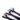 White background with a close up of three black doubled headed toothbrushes for dogs pictured.