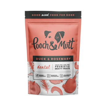 White background with a orange packet of Pooch & Mutt dog treats. The text on the packet states 'Duck & Rosemary, Dental, Grain-free, Junk-free, Probiotic Meaty Treats.'