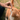 Ginger and white cat being given a PlaqueOff Dental bite.