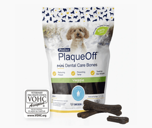 White background with a packet of ProDen PlaqueOff Mini Dental Care Bones - Veggie flavour for Small Dogs. Pictured on the packet is a long haired cream dog.