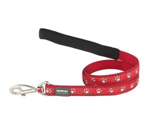 White background with a red 'Red Dingo' with white paws dog lead.