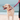Yellow Labrador dog wearing a red 'Red Dingo' dog collar and lead with white stars on it, on a beach.
