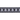 White background with a close up view of a black cat collar with silver reflective fish on it.