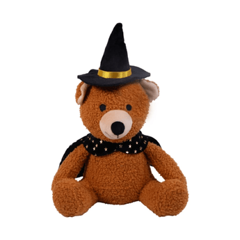 A Rosewood Wilbert Wizard brown teddy bear dog toy wearing a black wizard hat with a gold band and a black star-patterned collar, isolated on a white background.