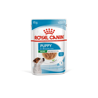 White background with a sachet of Royal Canin Mini Puppy in gravy. Pictured on the packet is a Jack Russell puppy, text on the tin states '2 -10 months'.