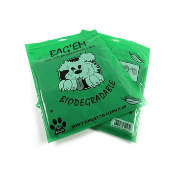 White background with two green packets of BAG'EM scented biodegradable dog waste bags, with an illustrated dog on the pack. Text below says 'Don't forget to clean it up'.