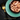 Black background with a teal bowl of Sheba Chicken and Tuna Filets wet food in gravy pictured.