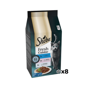 White background with a packet of Sheba Cuisine Taste of Tokyo in gravy, Tuna, Salmon and Whitefish. Pictured on the packet is a British blue cat.
