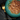 Black background with a teal bowl of Sheba sauce collection wet food in sauce pictured.