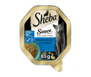 White background with a tray of Sheba Sauce Collection with Tuna in sauce, pictured on the front is a British blue cat.
