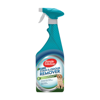White background with a spray bottle of Simple Solution Stain & Odour Remover - Rainforest Fresh, on the bottle is a picture of a Labrador puppy.