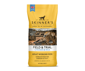 A 2.5kg bag of Skinner's Field & Trial Chicken & Rice dog food for adult working dogs, featuring a bright yellow packaging with a detailed illustration of a farm scene on the front.