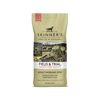 A bag of Skinner's Field & Trial Grain Free Chicken and Sweet Potato dog food for adult working dogs, featuring a beige packaging design with a central illustration of a hunting scene.