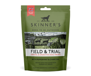 A stand-up pouch of Skinner's Field & Trial dental and digestive dog treats, featuring an olive green background with a central scenic illustration and a red British Made in UK badge.