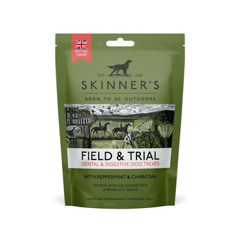 A stand-up pouch of Skinner's Field & Trial dental and digestive dog treats, featuring an olive green background with a central scenic illustration and a red British Made in UK badge.