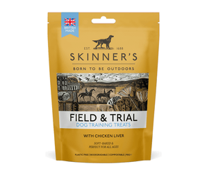 A package of Skinner's Field & Trial dog training treats, featuring a mustard yellow pouch with a central illustration of a hunting scene and a blue 'British Made' badge.