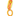 Plastic hot dog in a bun with yellow mustard on a keyring with a yellow button and a orange coil bracelet attached on a white background.