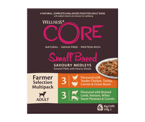 White background with a box of Wellness CORE Small Breed Dog food pictured. On the box is a bowl of wet food and text 'Wellness CORE, Natural, Grain Free, Protein-Rich, Small Breed, Savoury Medleys, Farmer Selection Mutlipack Adult.'
