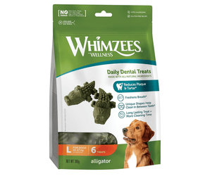 White background with a green and white bag of Whimzeez Dental Alligator Treats with a golden retriever type dog pictured on the packet.