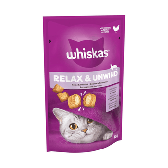 White background with a purple packet of Whiskas Relax & Unwind Treats, on the packet is silver tabby cat's face under a purple blanket. Text on the pack reads 'Whiskas Relax & Unwind, with Relaxing amino acid for calmness.'