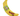 Fabric yellow banana shaped cat toy with green labelled attached picturing a yellow cat with a Tutti Fruitti hat with text 'Yeowww!' coming from its mouth and 'Banana' written below. Pictured on a white background.